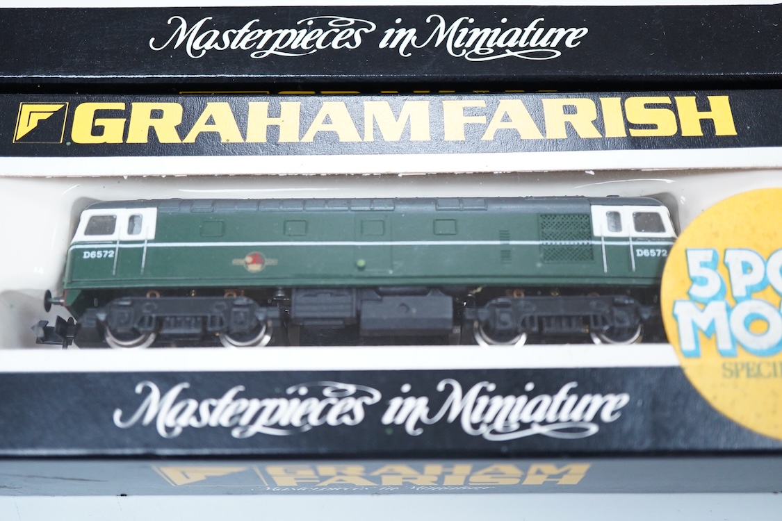 Four boxed Graham Farish N gauge railway Class 33 diesel locomotives; a BR, D6572 (8314), a BR Distribution Sector, 33 205 (8317), an EWS, 33030 (831A) and a BR, 33025 (8312).